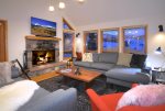 Cozy up to the wood fireplace or watch the Big Game